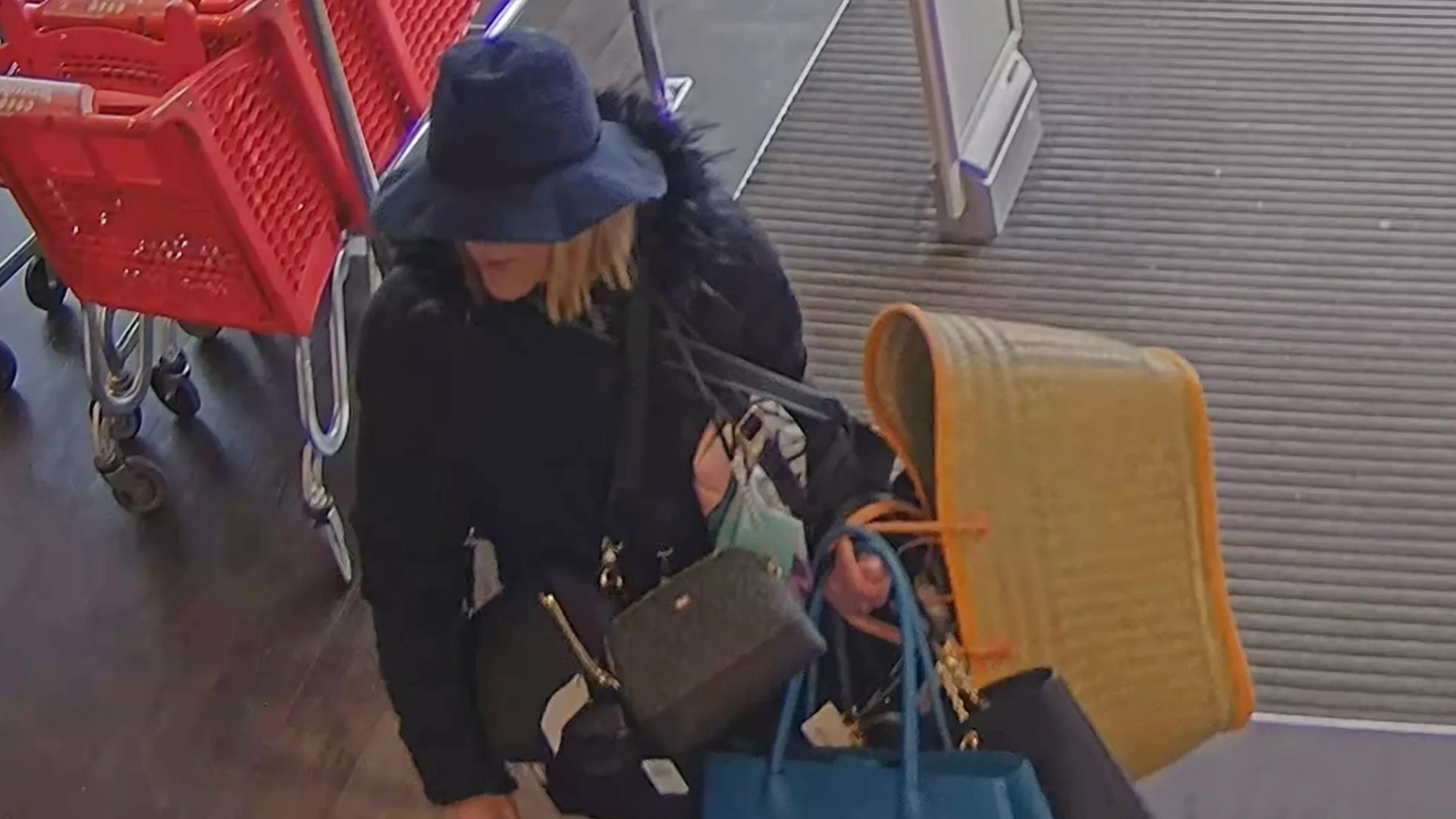 Moment Britain’s most prolific female shoplifter with 171 convictions flees store while disguised under huge hat